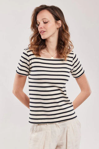Woman wearing short-sleeve navy and white striped cotton marinière top