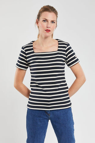 Woman wearing navy and white striped short-sleeve cotton marinière top with square neckline