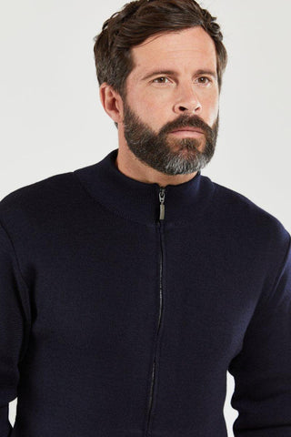 Man wearing navy wool zip cardigan with high collar, close-up view