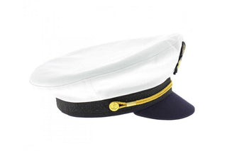 White and navy blue captain's hat with gold detailing on a plain background