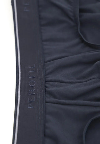 Close-up of navy blue men's brief underwear with elastic waistband, Perofil logo visible