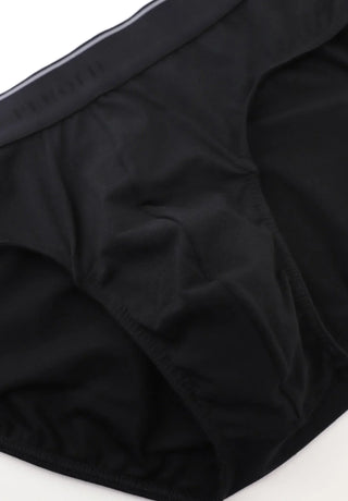 Close-up of black men's cotton briefs with elastic waistband, basic underwear style
