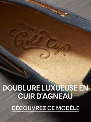 Close-up of Sperry Gold Cup men's navy shoe with luxurious lambskin leather lining.