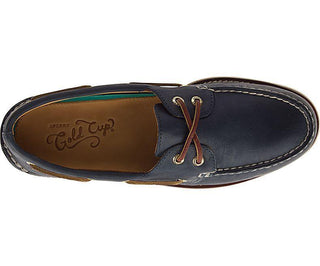 Men's navy leather boat shoe with brown laces and contrast stitching, top view
