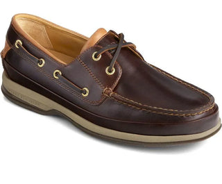 Men's brown leather boat shoe with tan sole and gold eyelets, classic nautical footwear